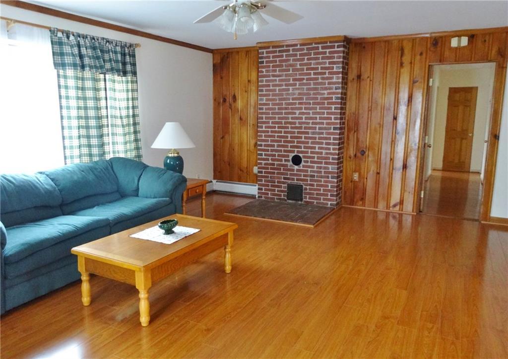 248 Davis Road Bangor, ME 04401 - Photo 11 of 35 This expansive living room has a...