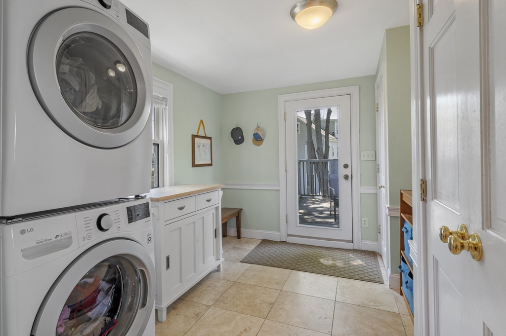 11 Williams Street, Unit 2 Salem, MA 01970 - Photo 12 of 33 a view of a hallway with washer and dryer