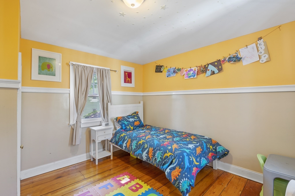 11 Williams Street, Unit 2 Salem, MA 01970 - Photo 14 of 33 a bedroom with a bed and a window
