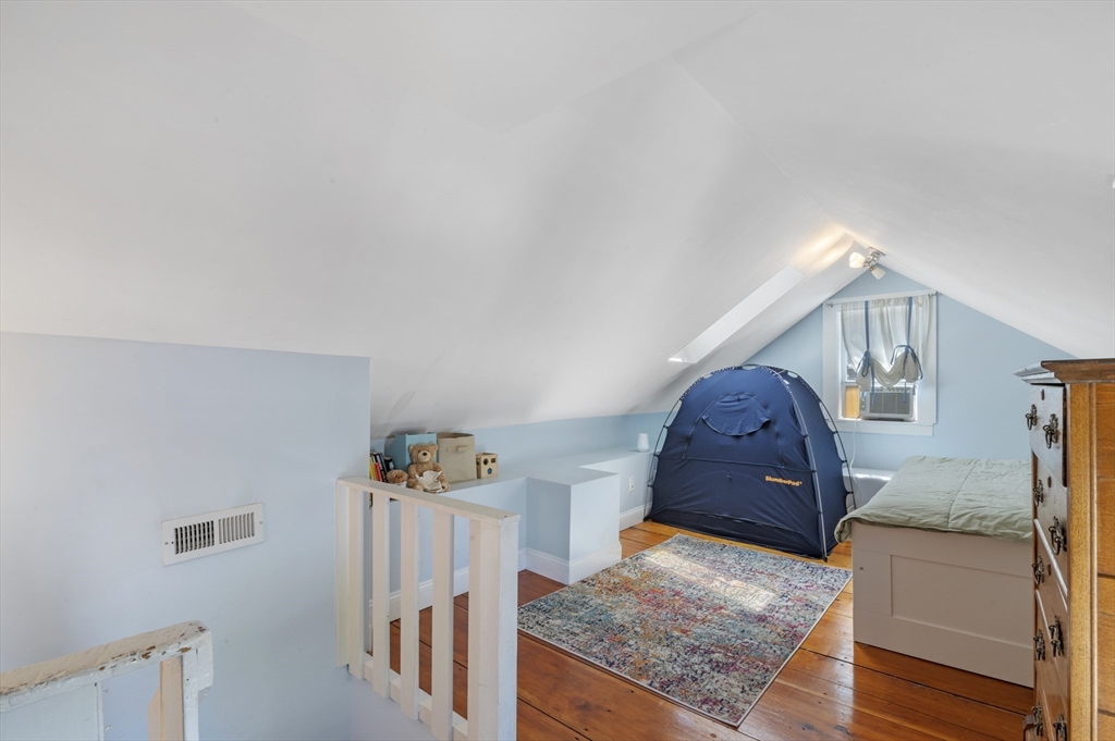 11 Williams Street, Unit 2 Salem, MA 01970 - Photo 22 of 33 a living room with furniture and a rug