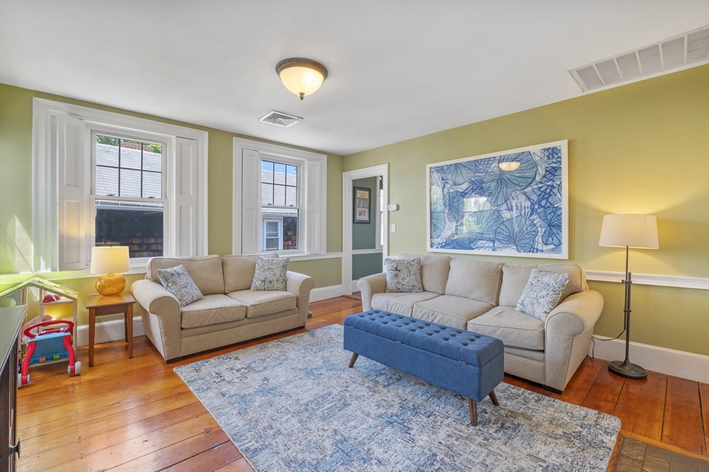 11 Williams Street, Unit 2 Salem, MA 01970 - Photo 4 of 33 a living room with furniture and a large window
