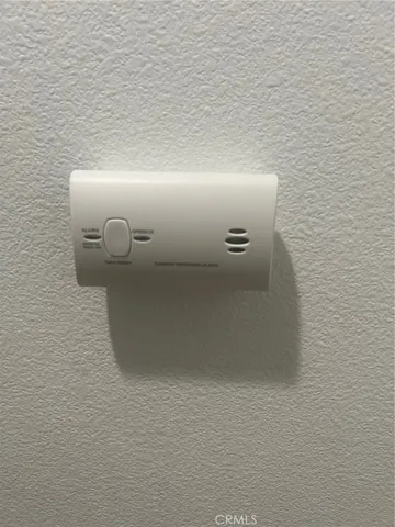 a view of storage and utility room with washer and dryer