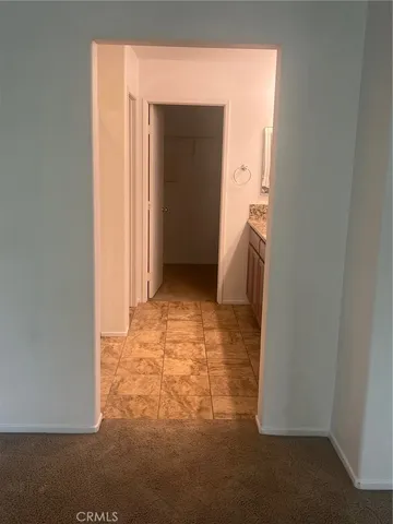 a bathroom with a window and a shower