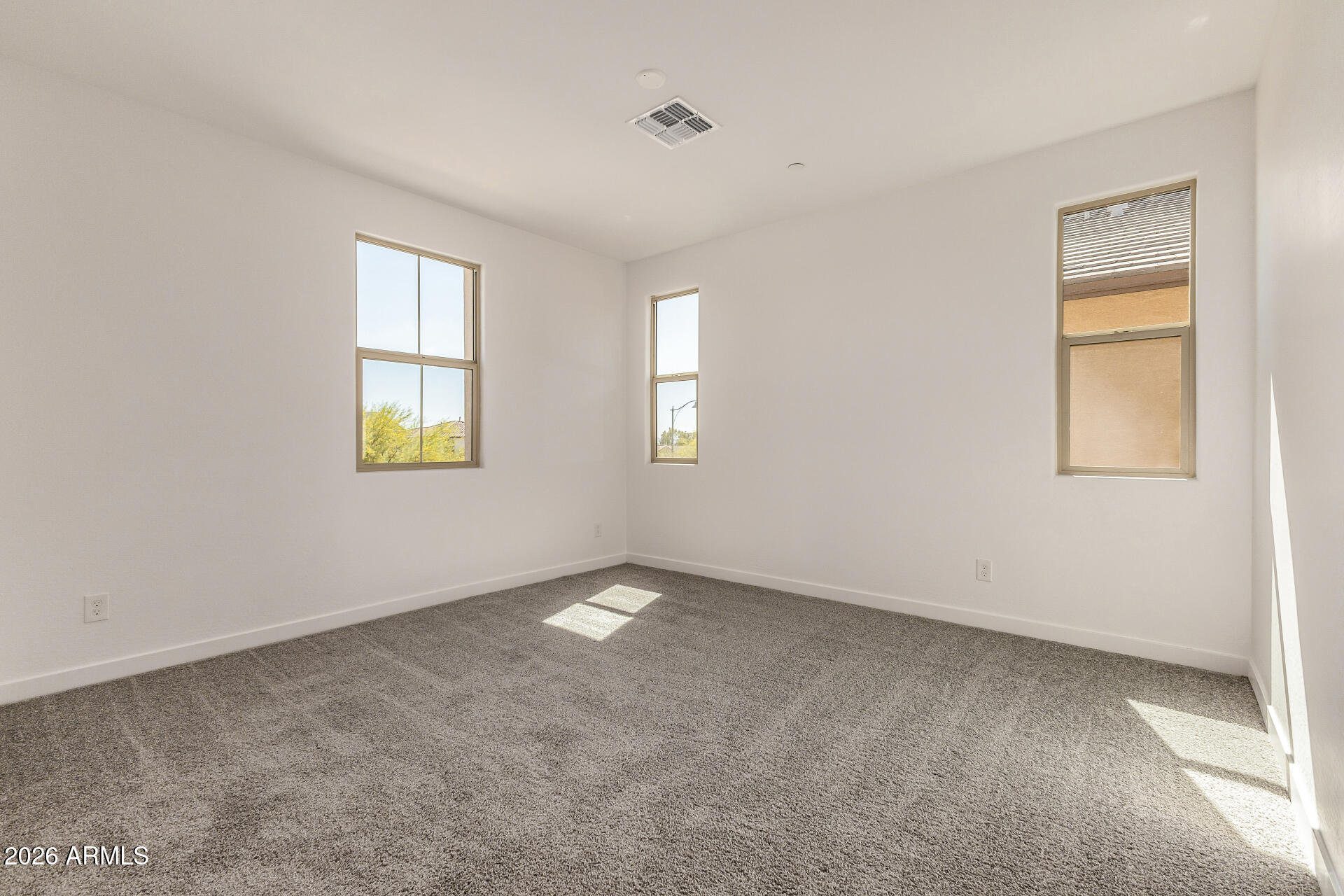 20618 West Thomas Road Buckeye, AZ 85396 - Photo 15 of 38 an empty room with windows
