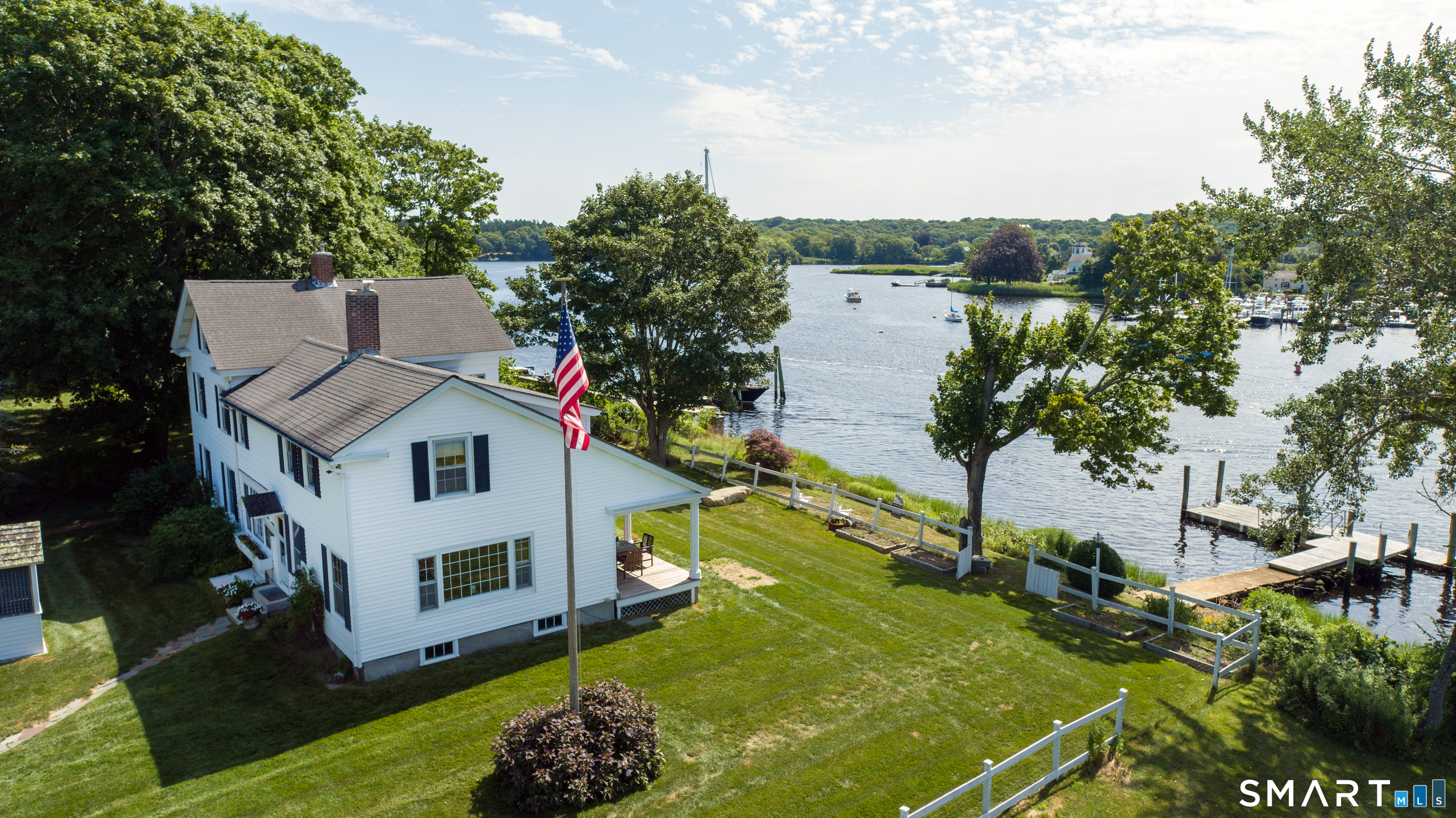 417 River Road Stonington, CT 06379 - Photo 1 of 36 House sits on .33 acre parcel with private, deep-water dock.