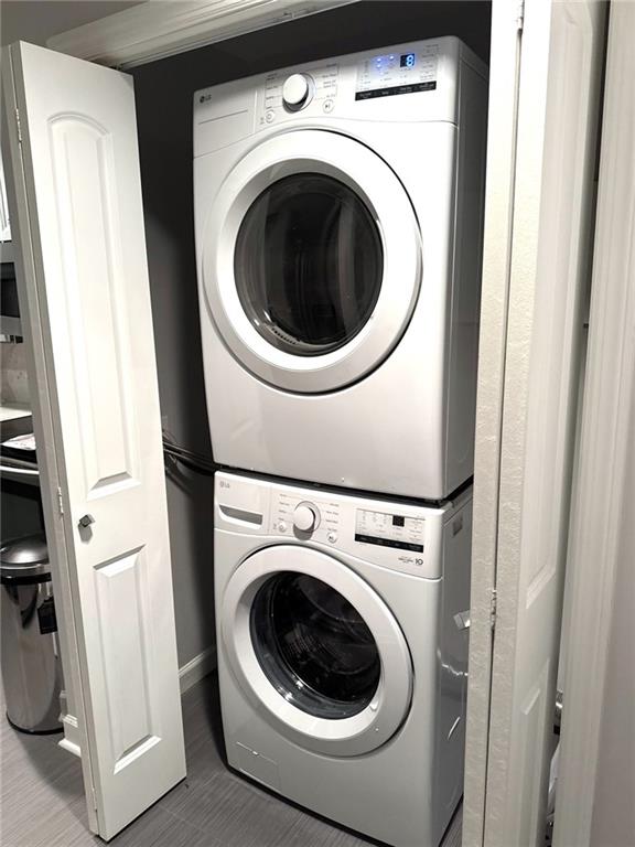 195 14th Street Northeast, Unit 312 Atlanta, GA 30309 - Photo 25 of 33 a utility room with dryer and washer