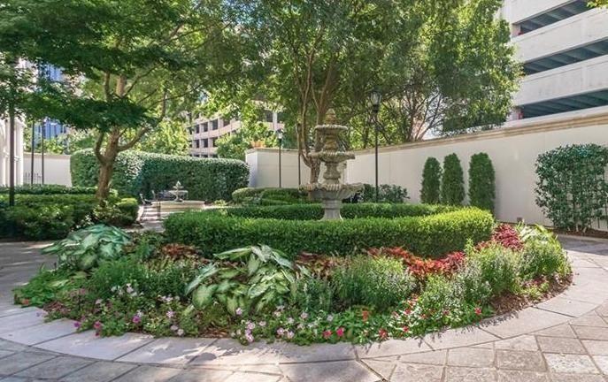 195 14th Street Northeast, Unit 312 Atlanta, GA 30309 - Photo 4 of 33 a view of a garden with pathway
