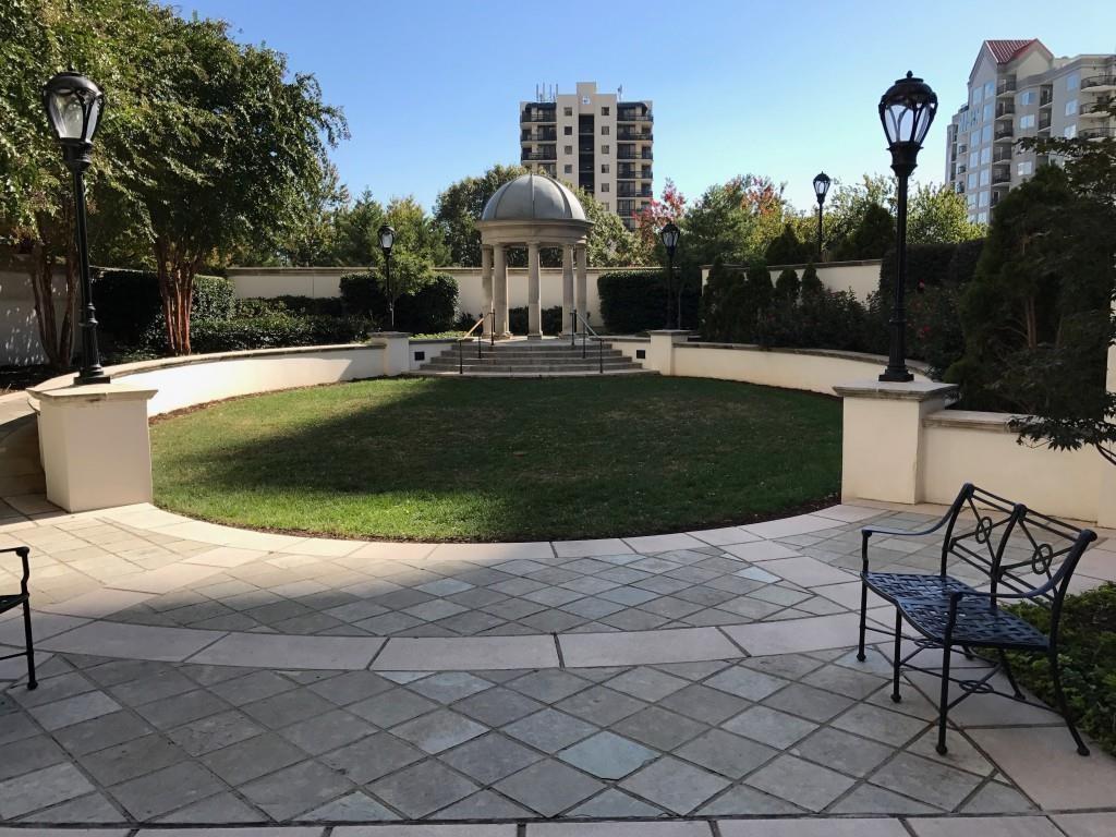 195 14th Street Northeast, Unit 312 Atlanta, GA 30309 - Photo 8 of 33 a view of a fountain in the backyard of a house