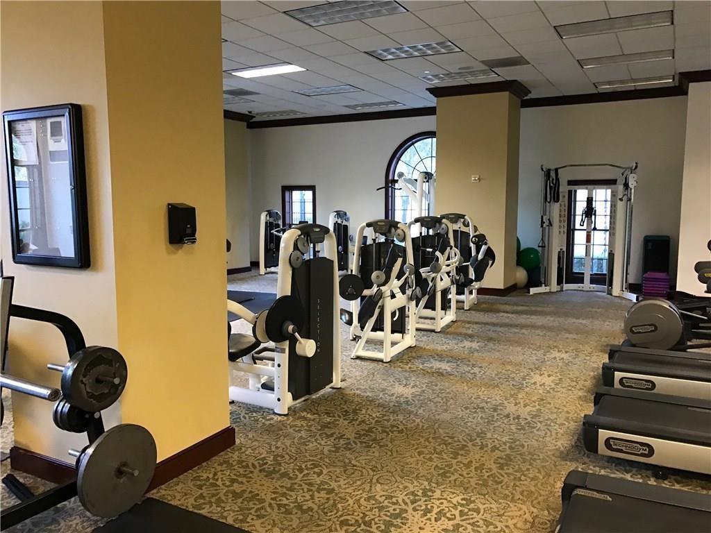 195 14th Street Northeast, Unit 312 Atlanta, GA 30309 - Photo 9 of 33 a view of a room with gym equipment