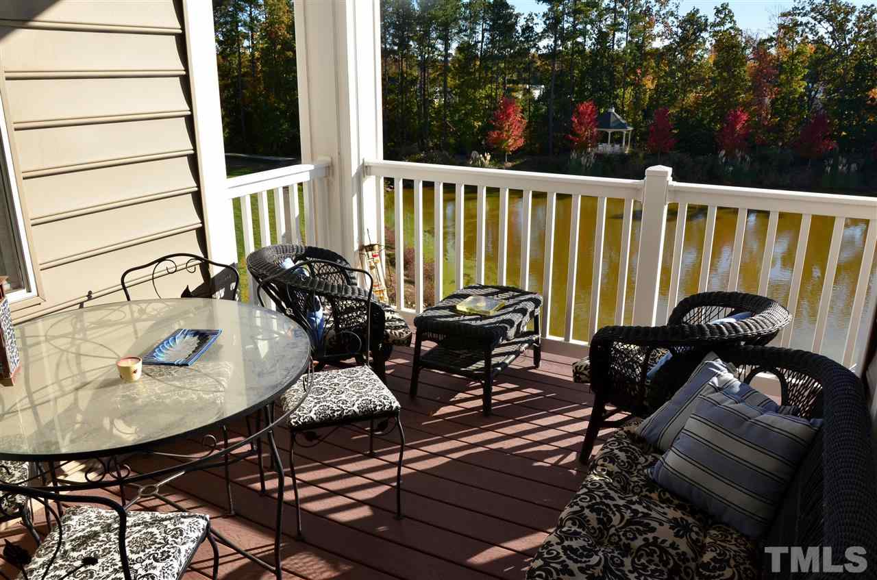 10421 Rosegate Court, Unit 203 Raleigh, NC 27617 - Photo 2 of 8 a view of a balcony with chairs