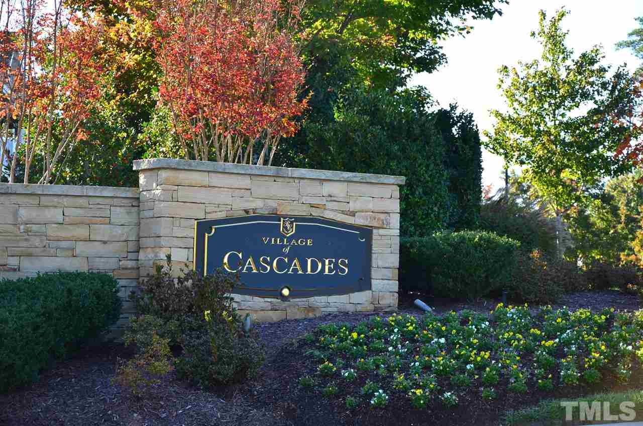 10421 Rosegate Court, Unit 203 Raleigh, NC 27617 - Photo 3 of 8 a view of sign board and green space