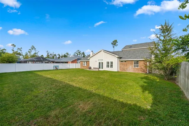 a view of outdoor space yard and front view of a house