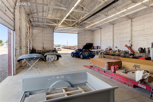 7935 Mohawk Road Colorado Springs, CO 80908 - Photo 20 of 33 Many overhead door options.
