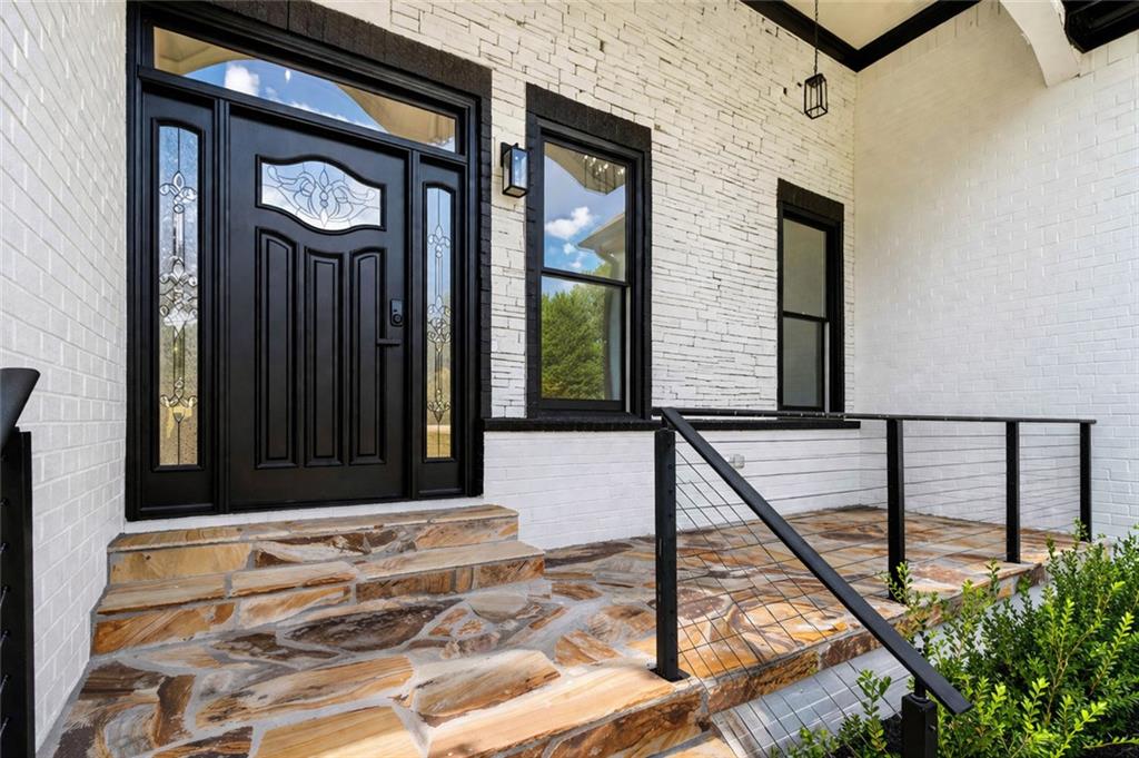 1217 Cabin Bridge Road Bethlehem, GA 30620 - Photo 13 of 43 a view of a entryway door front of house