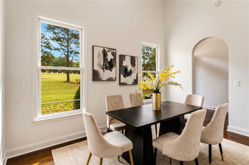 1217 Cabin Bridge Road Bethlehem, GA 30620 - Photo 21 of 43 a view of a dining room with a table and chairs