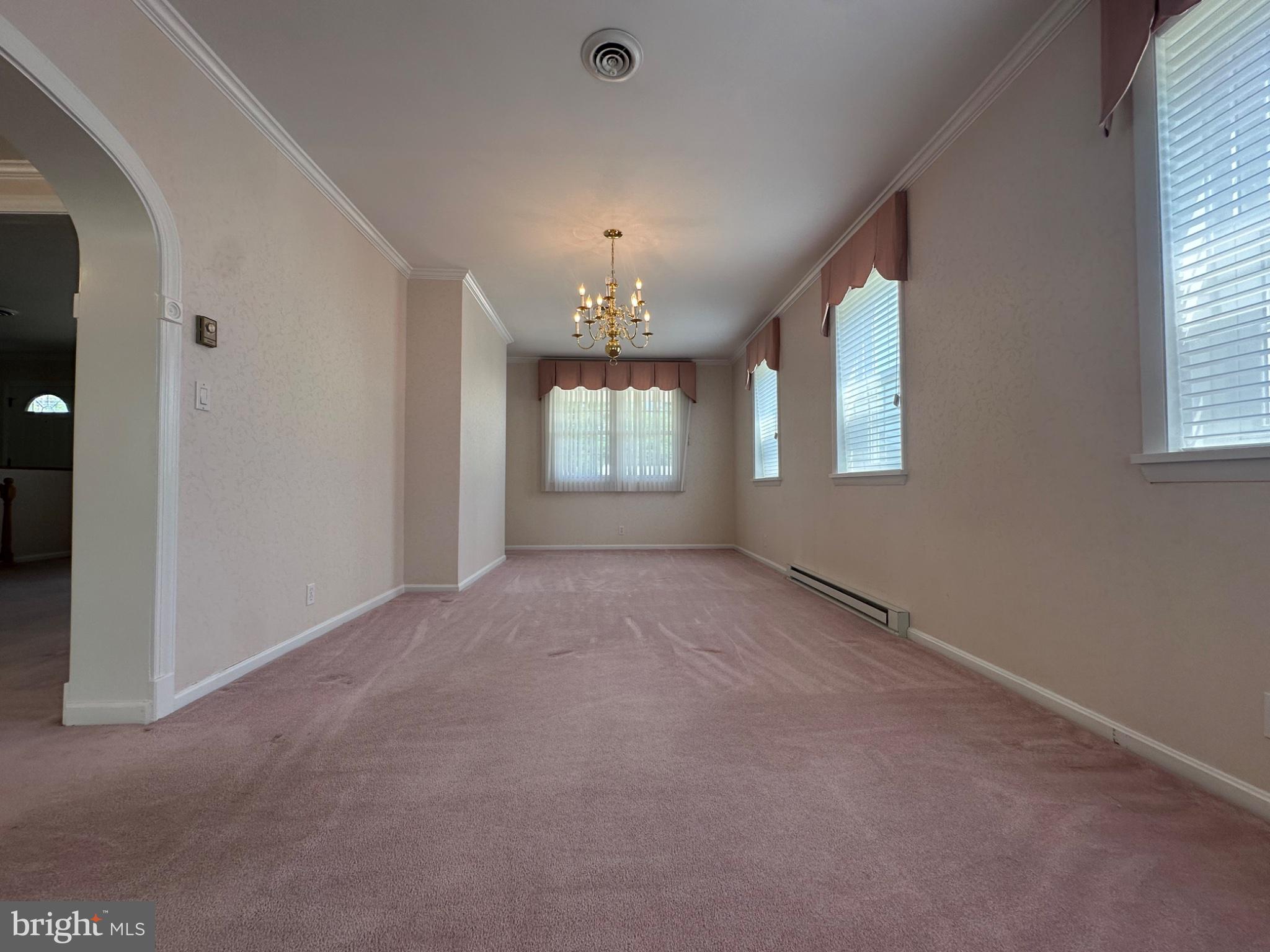 14616 Sturtevant Road Silver Spring, MD 20905 - Photo 9 of 44 Spacious room with soft natural light.