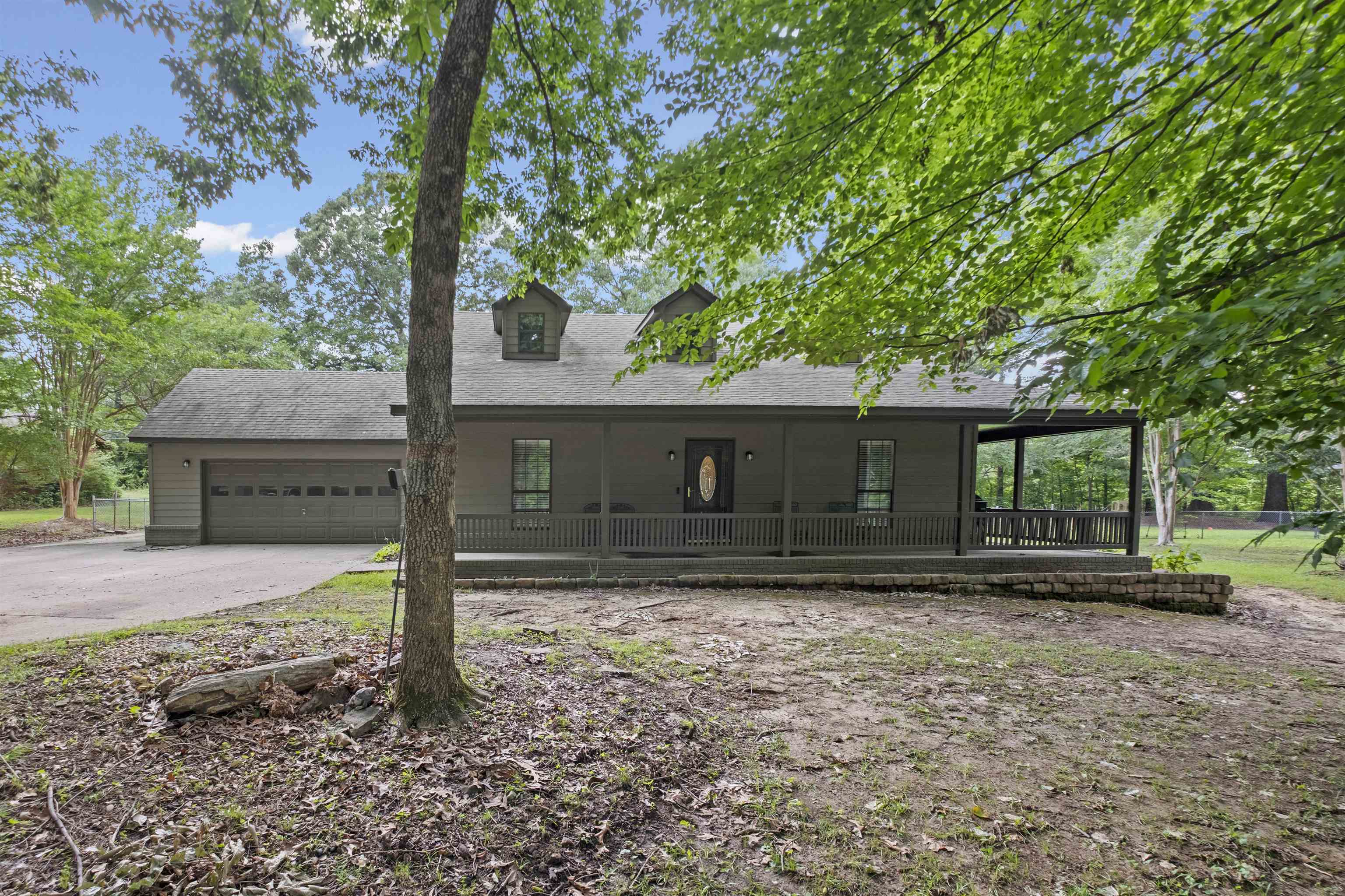 3601 Marshall Road Munford, TN 38058 - Photo 4 of 35 Ranch-style exterior with a covered front porch featuring a railing system