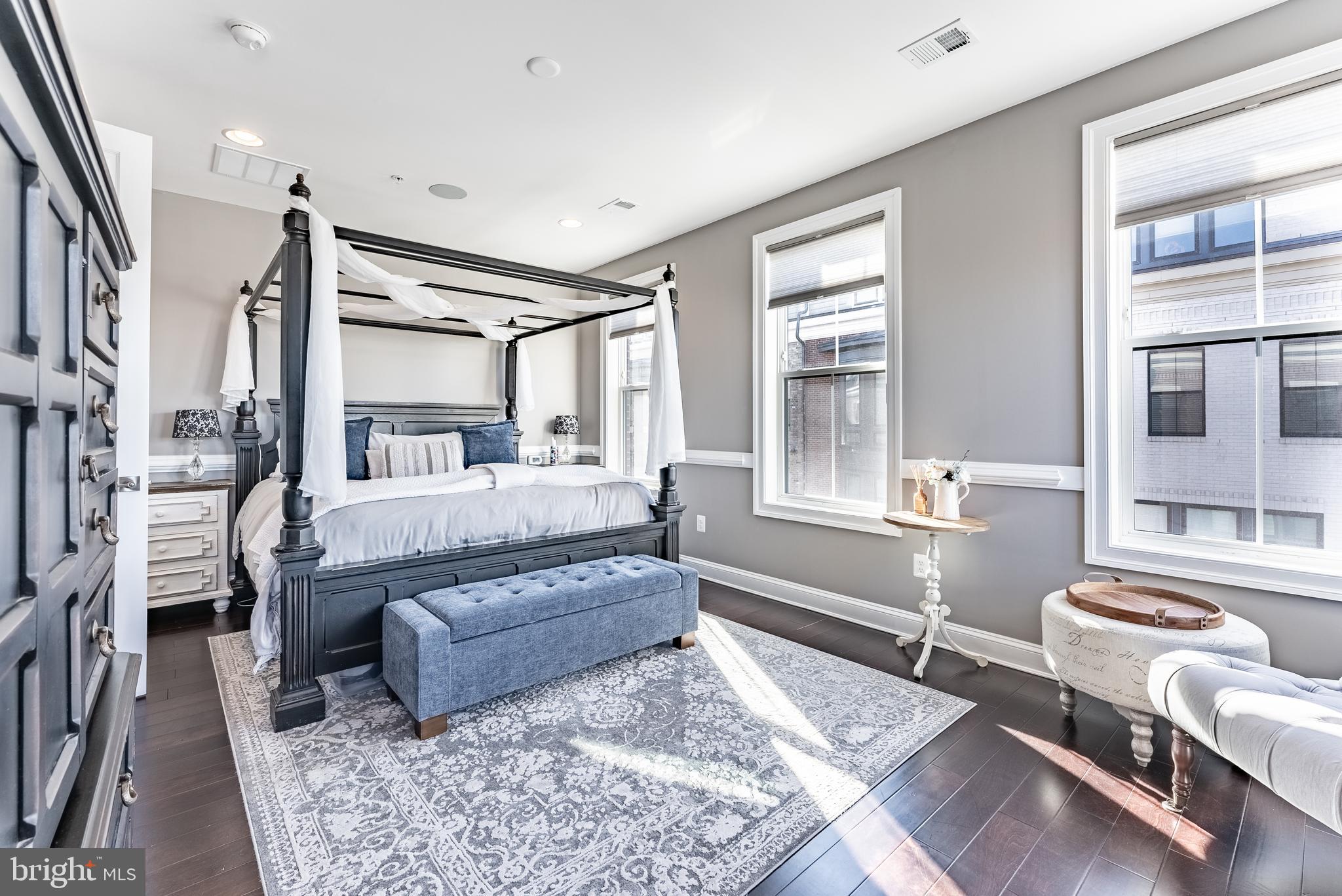 500 Riversail Lane, Unit 438 Oxon Hill, MD 20745 - Photo 19 of 54 a living room with furniture and a large window