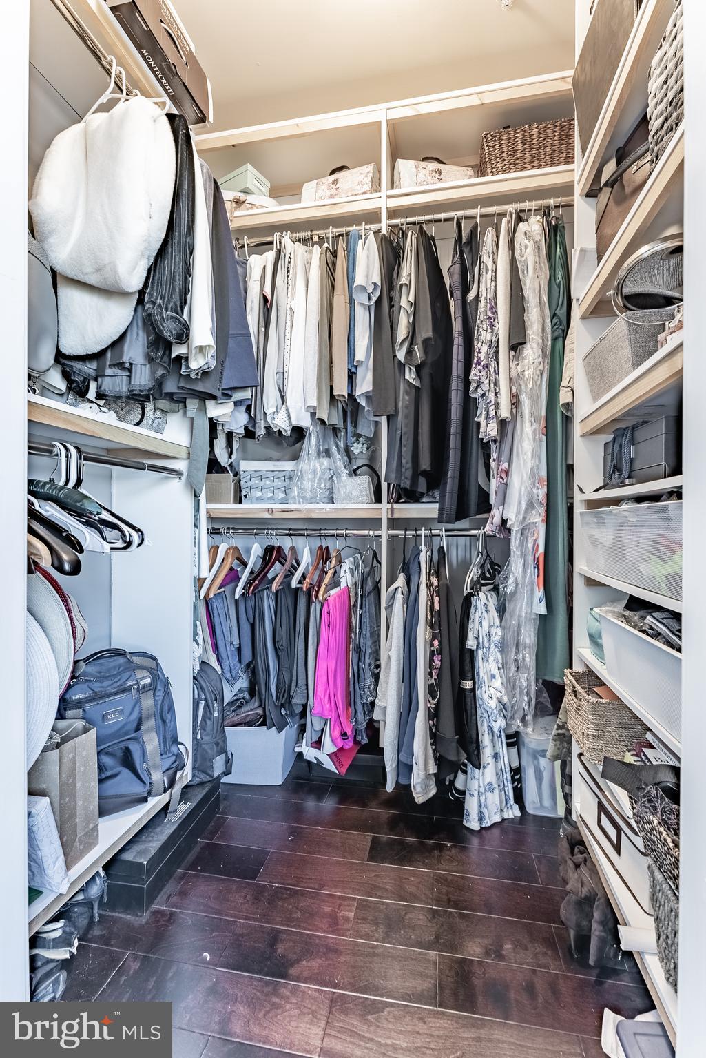 500 Riversail Lane, Unit 438 Oxon Hill, MD 20745 - Photo 24 of 54 a view of walk in closet with clothes and shoes