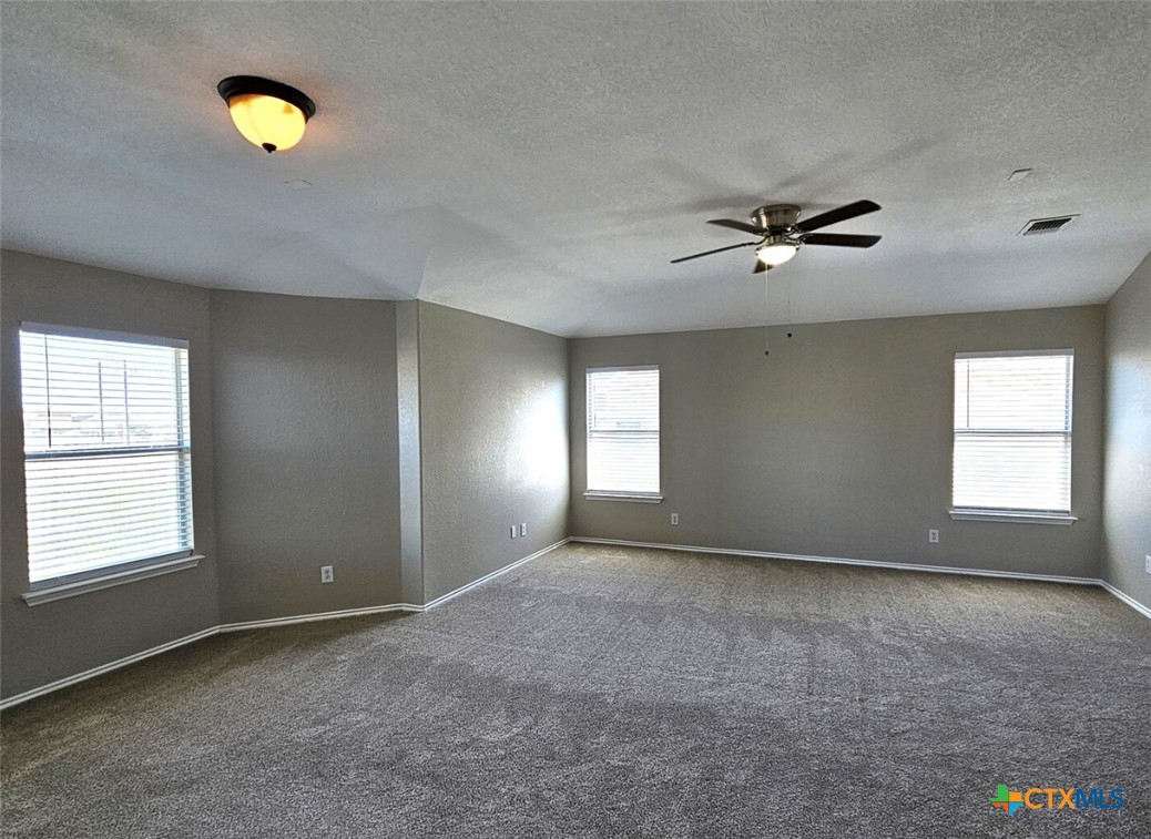 316 Julian Point Cibolo, TX 78108 - Photo 23 of 28 a view of an empty room with a window