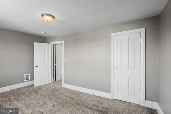 a view of a livingroom with a window
