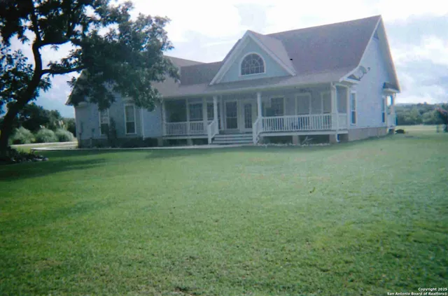 a view of a house with a swimming pool