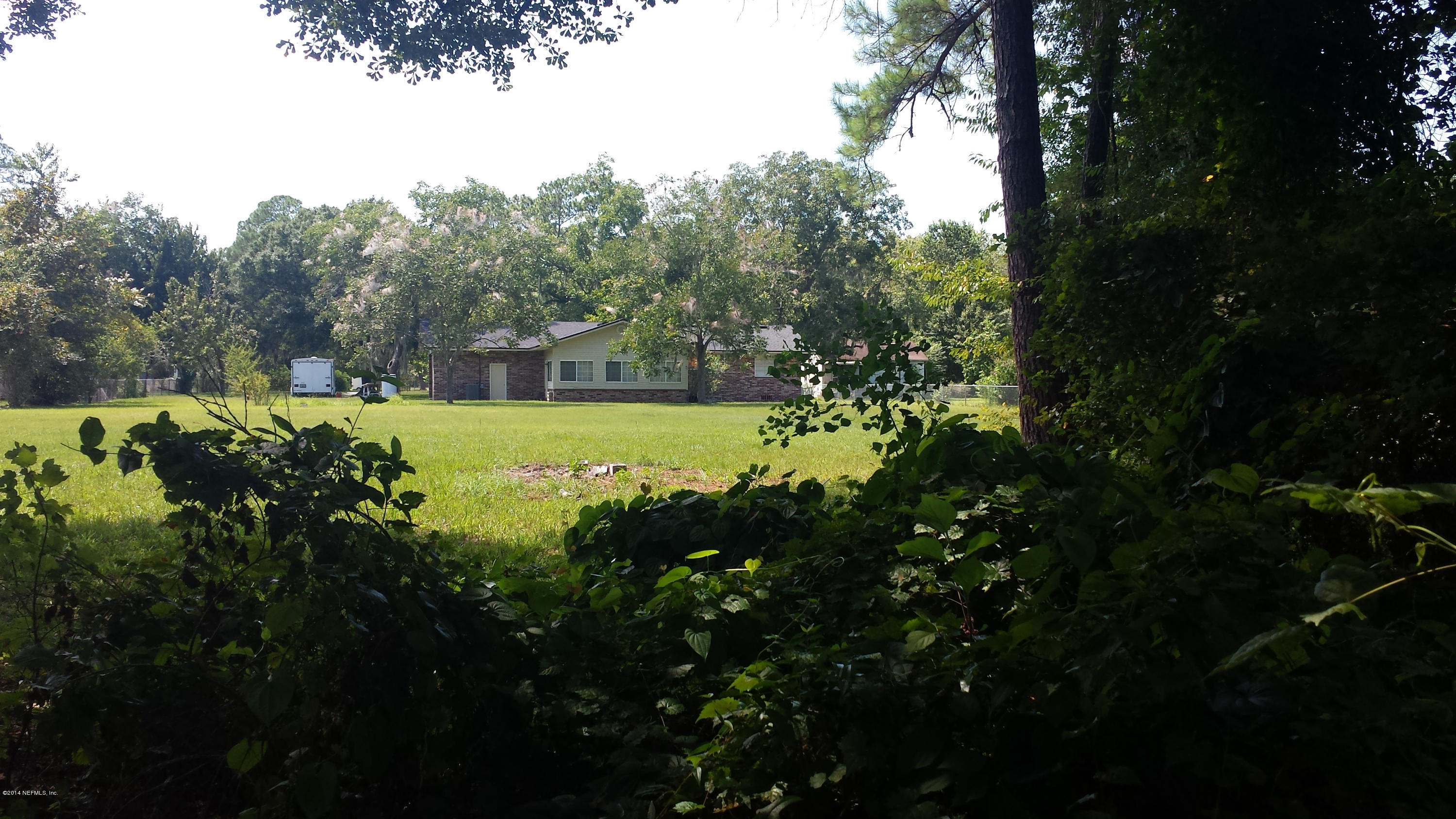 11357 Duval Road Jacksonville, FL 32218 - Photo 20 of 24 FROM TRAIL TO BACK OF HOUSE