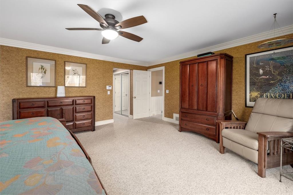 2010 Carrington Court Smoke Rise, GA 30087 - Photo 18 of 56 a bed room with a bed and a furniture