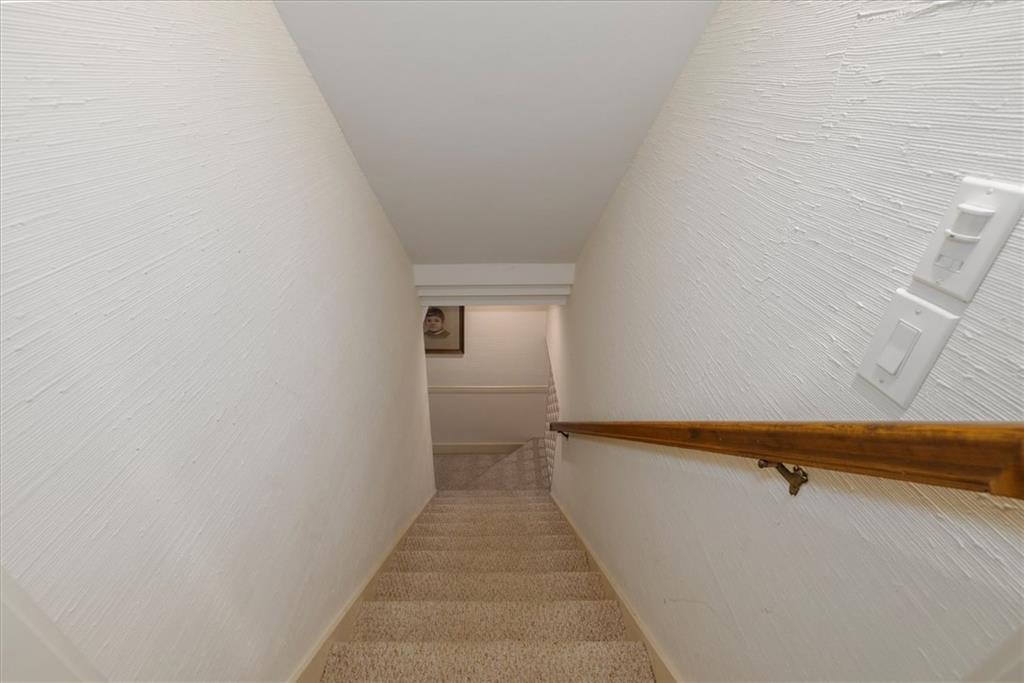2010 Carrington Court Smoke Rise, GA 30087 - Photo 35 of 56 a view of a room with wooden floor