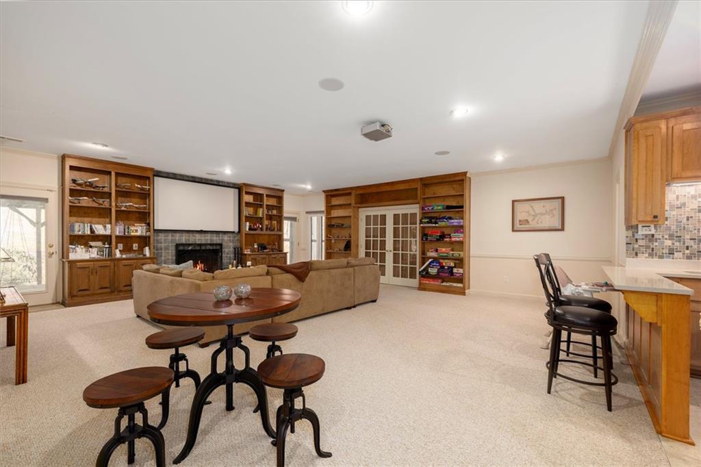 2010 Carrington Court Smoke Rise, GA 30087 - Photo 37 of 56 a room with furniture and a wooden floor