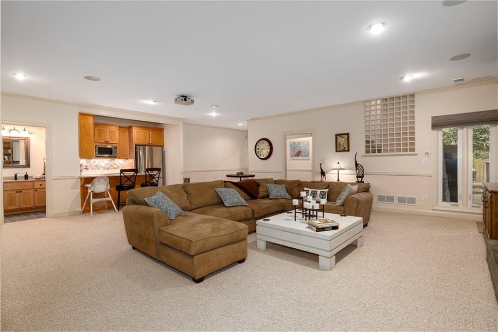 2010 Carrington Court Smoke Rise, GA 30087 - Photo 38 of 56 a living room with furniture and couches