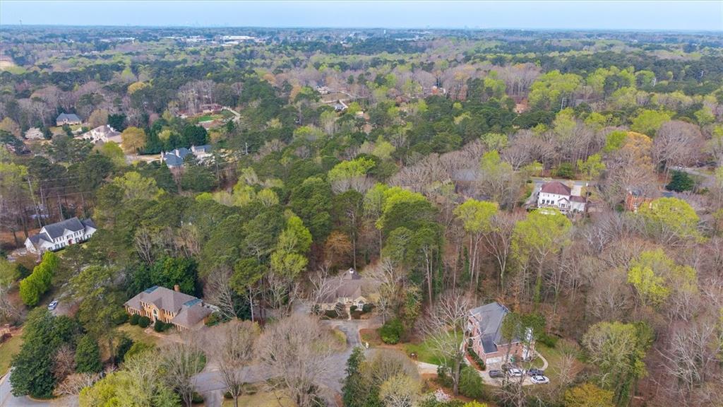 2010 Carrington Court Smoke Rise, GA 30087 - Photo 49 of 56 an aerial view of a city with lots of residential buildings