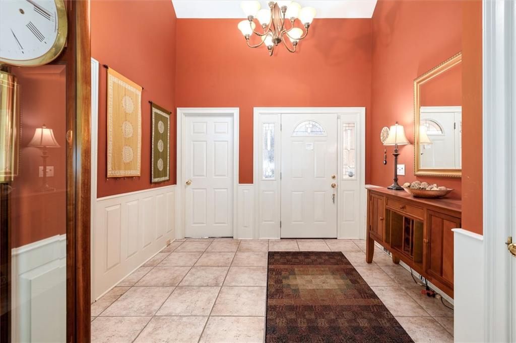 2010 Carrington Court Smoke Rise, GA 30087 - Photo 6 of 56 a view of a hallway with granite countertop a couch