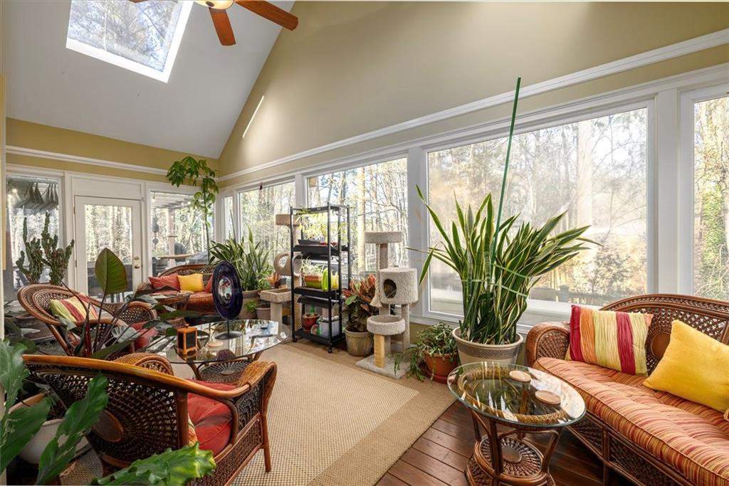 2010 Carrington Court Smoke Rise, GA 30087 - Photo 9 of 56 a living room with patio furniture and a large window