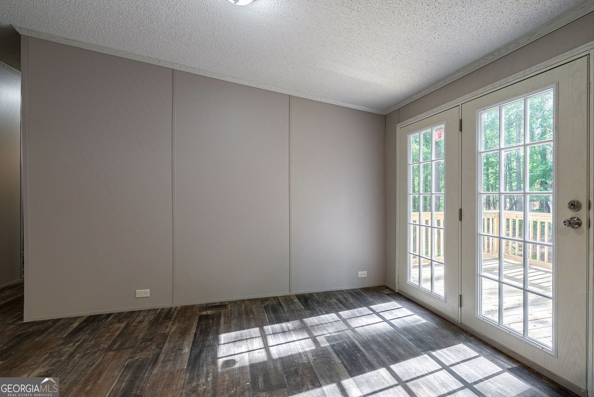 128 Sunfish Trail Southwest Eatonton, GA 31024 - Photo 11 of 48 a view of an empty room and window