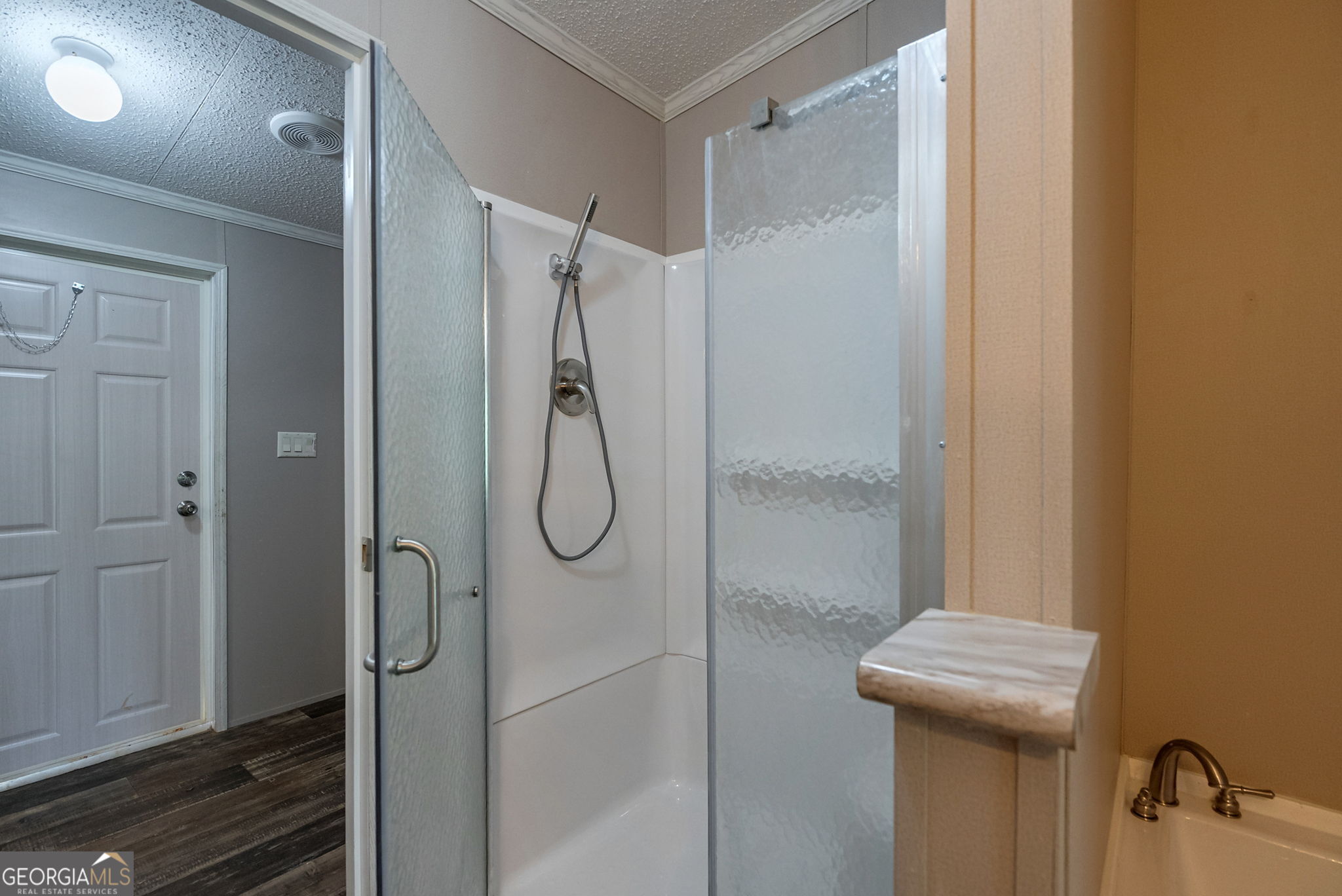 128 Sunfish Trail Southwest Eatonton, GA 31024 - Photo 34 of 48 a bathroom with a shower