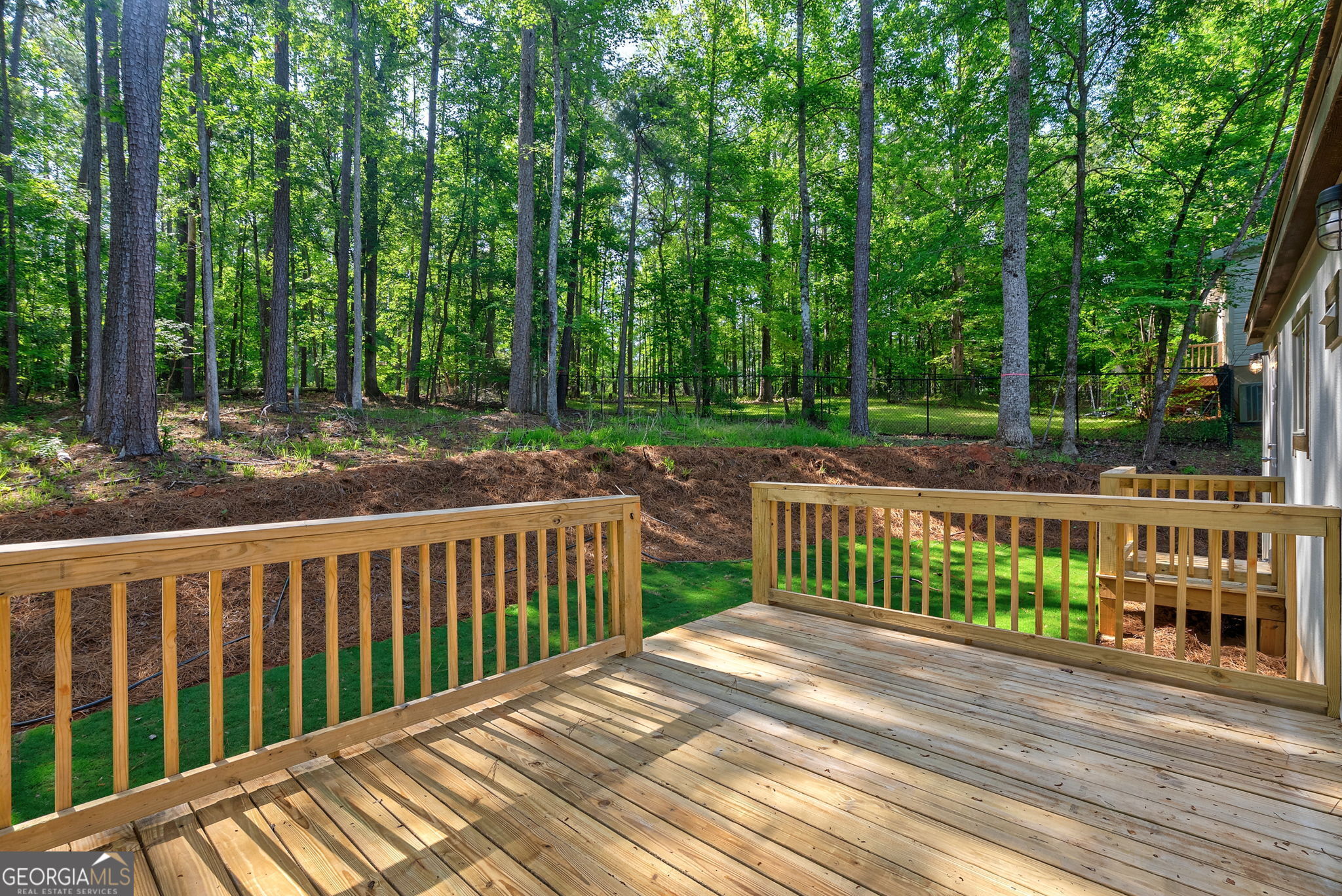 128 Sunfish Trail Southwest Eatonton, GA 31024 - Photo 35 of 48 a view of a wooden deck