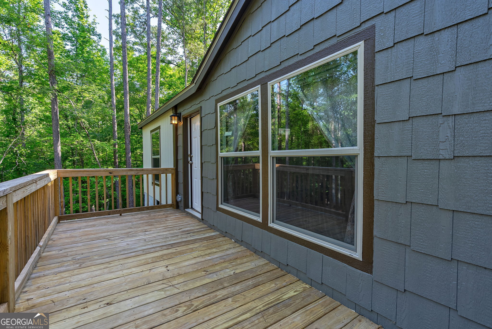 128 Sunfish Trail Southwest Eatonton, GA 31024 - Photo 4 of 48 a view of a wooden deck