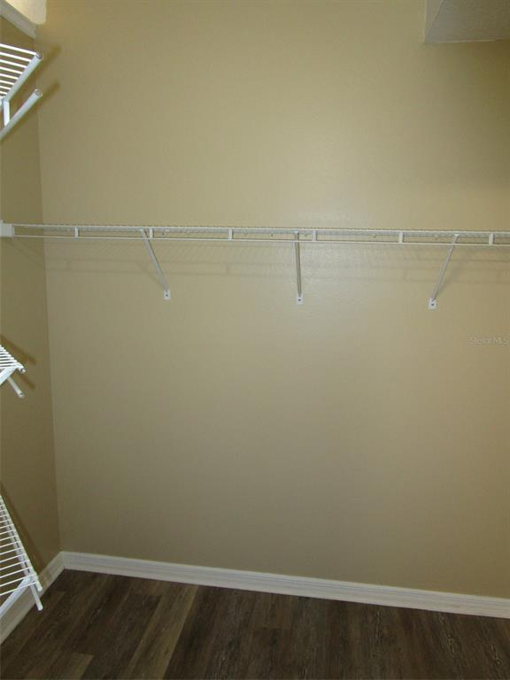 8826 Kilmer Way Hudson, FL 34667 - Photo 13 of 36 a view of small space with racks on the wall