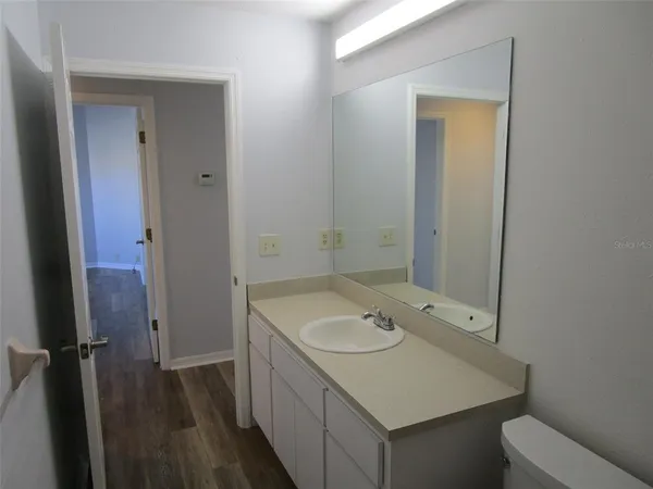 a bathroom with a sink and a toilet