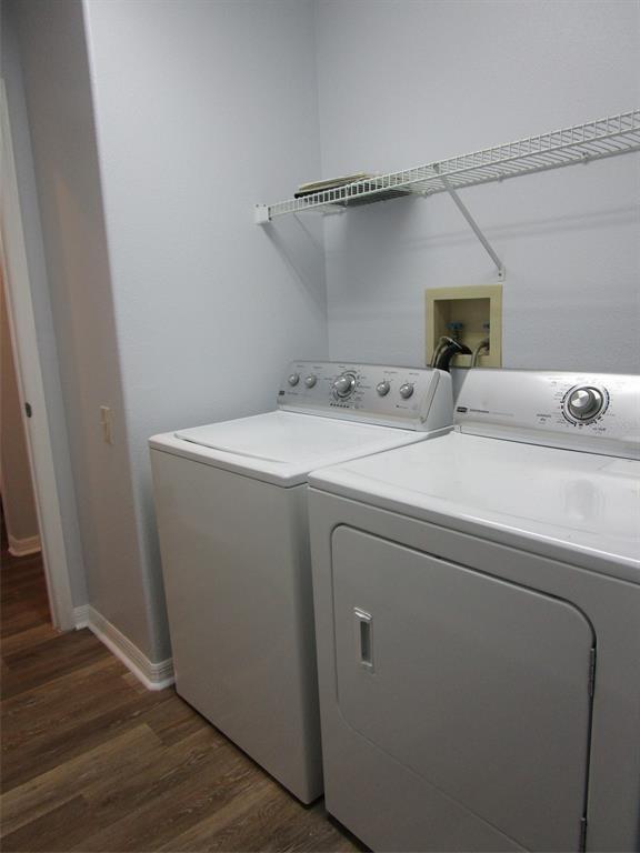 8826 Kilmer Way Hudson, FL 34667 - Photo 30 of 36 a utility room with dryer and washer