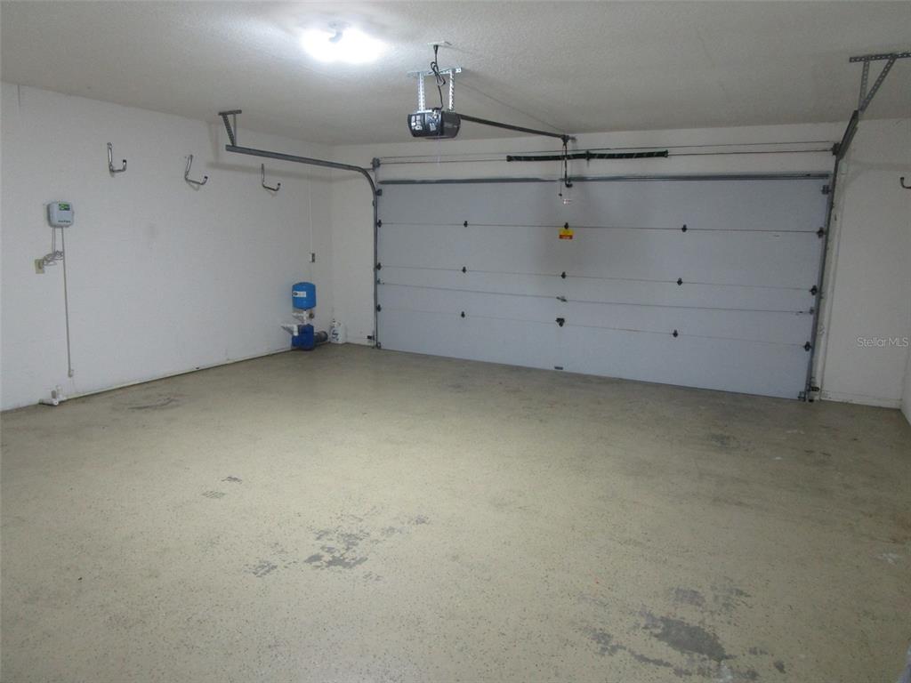 8826 Kilmer Way Hudson, FL 34667 - Photo 31 of 36 a view of a garage