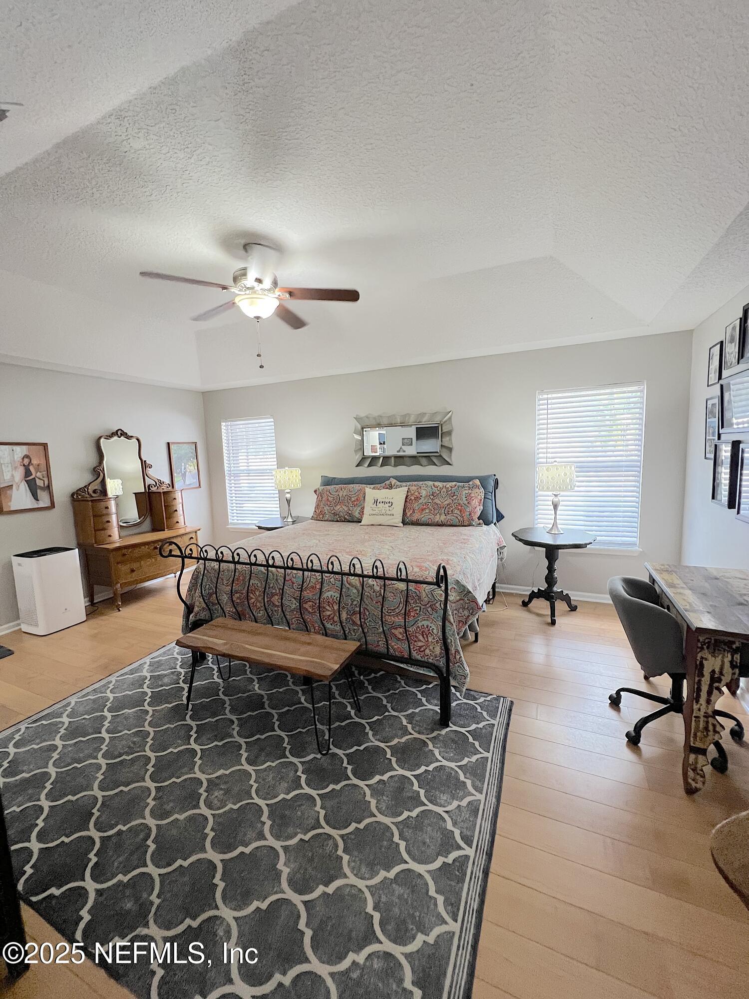 2020 Belle Grove Trace Fleming Island, FL 32003 - Photo 15 of 31 a living room with furniture and a gym machine