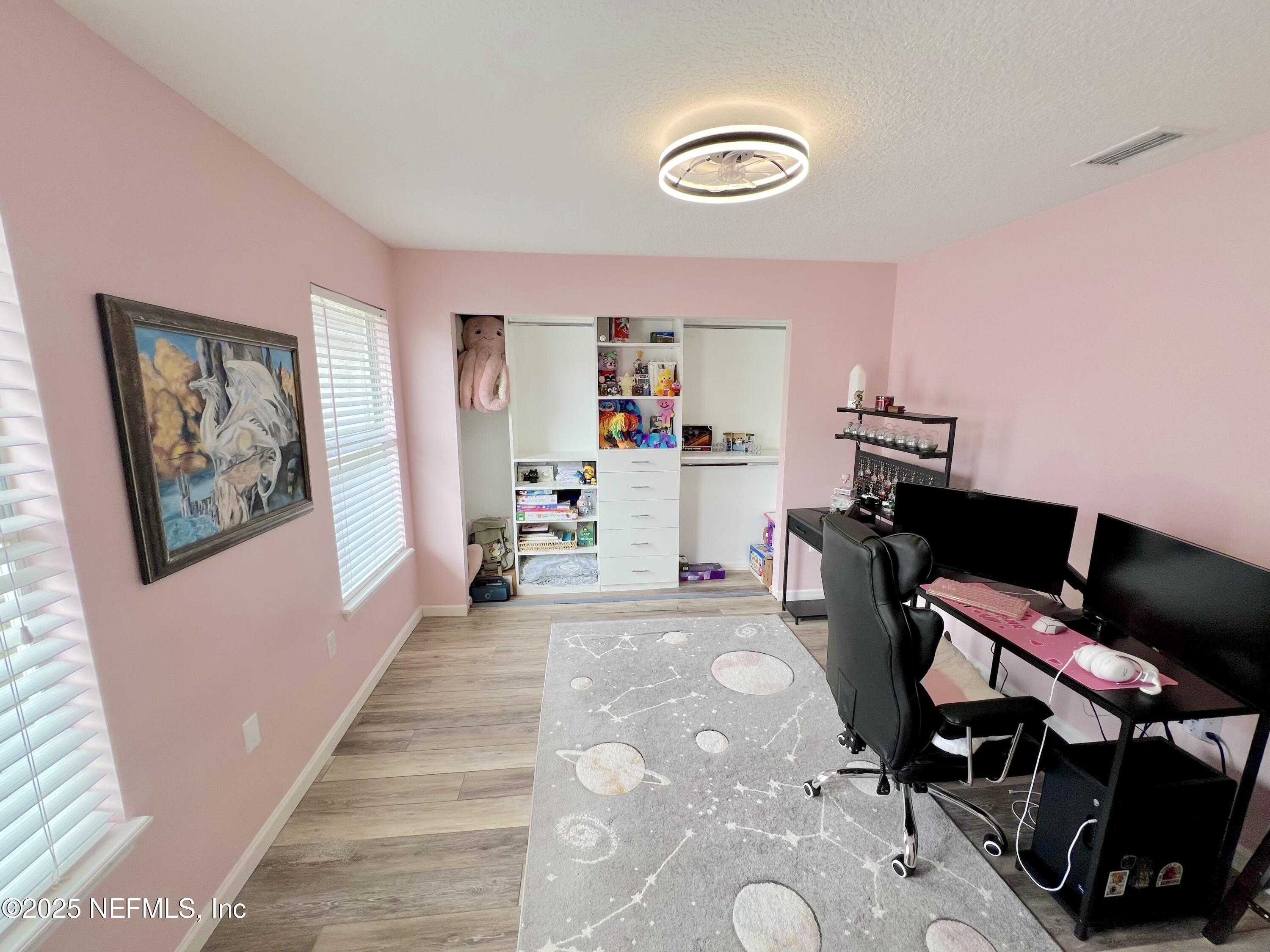 2020 Belle Grove Trace Fleming Island, FL 32003 - Photo 19 of 31 a living room with furniture