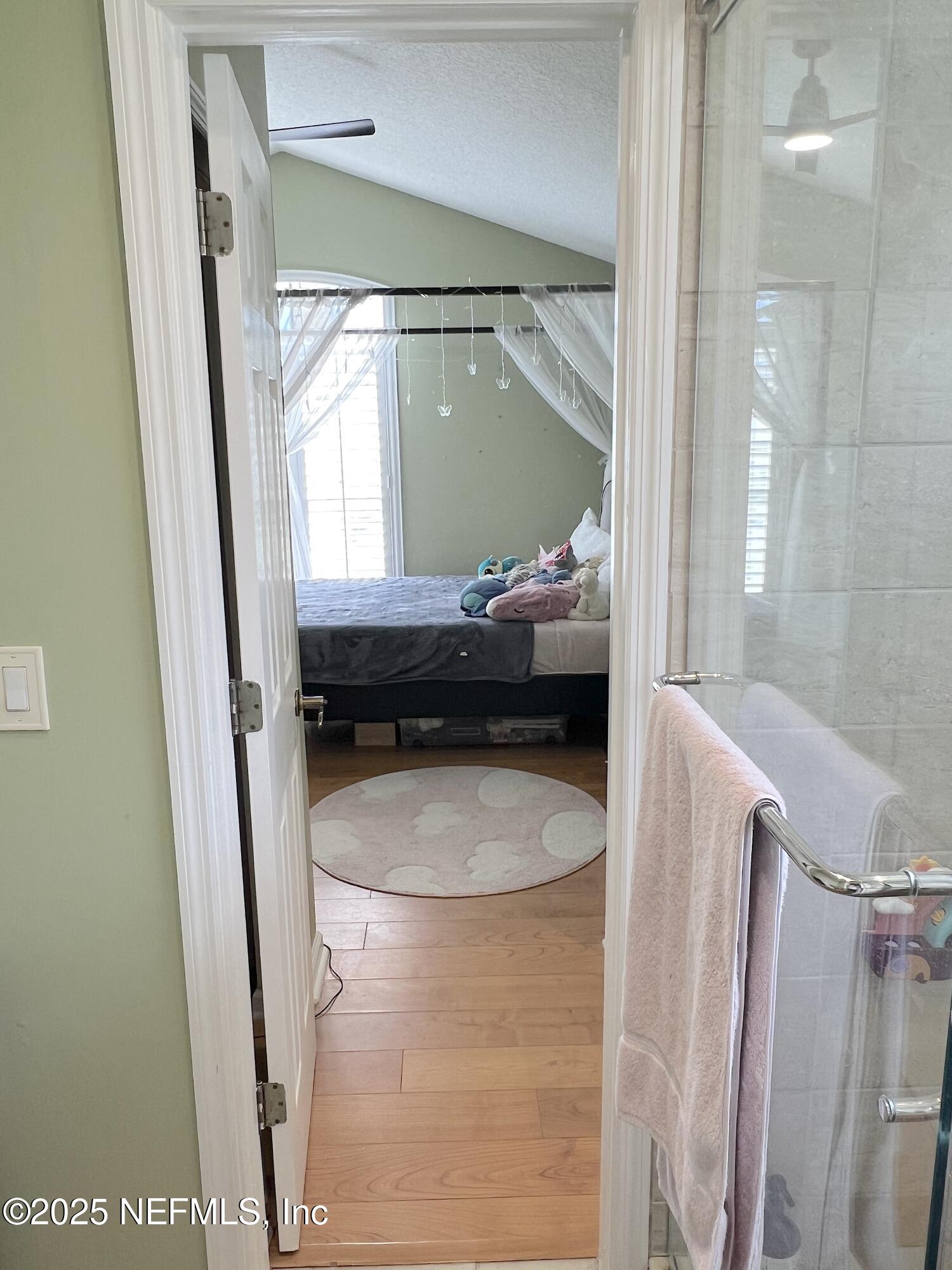 2020 Belle Grove Trace Fleming Island, FL 32003 - Photo 22 of 31 a living room with a washer and dryer