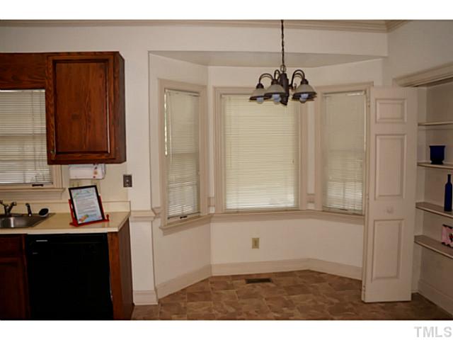 8444 Wycombe Lane Raleigh, NC 27615 - Photo 11 of 25 Enjoy the beauty of this community's lush landscaping as you sip your morning beverage from your breakfast room. The bay window highlights this eat-in area and lets in the sunshine!