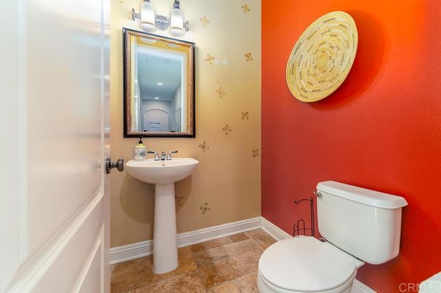 a outdoor space with patio furniture and potted plants