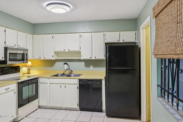 a view of a storage & utility room with washer and dryer