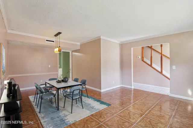a view of a livingroom with furniture and window