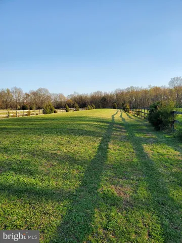 a view of a golf course with a lake